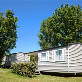 Mobil-home 27 m2- 2 chambres/4 pers avec terrasse dans parc arboré
