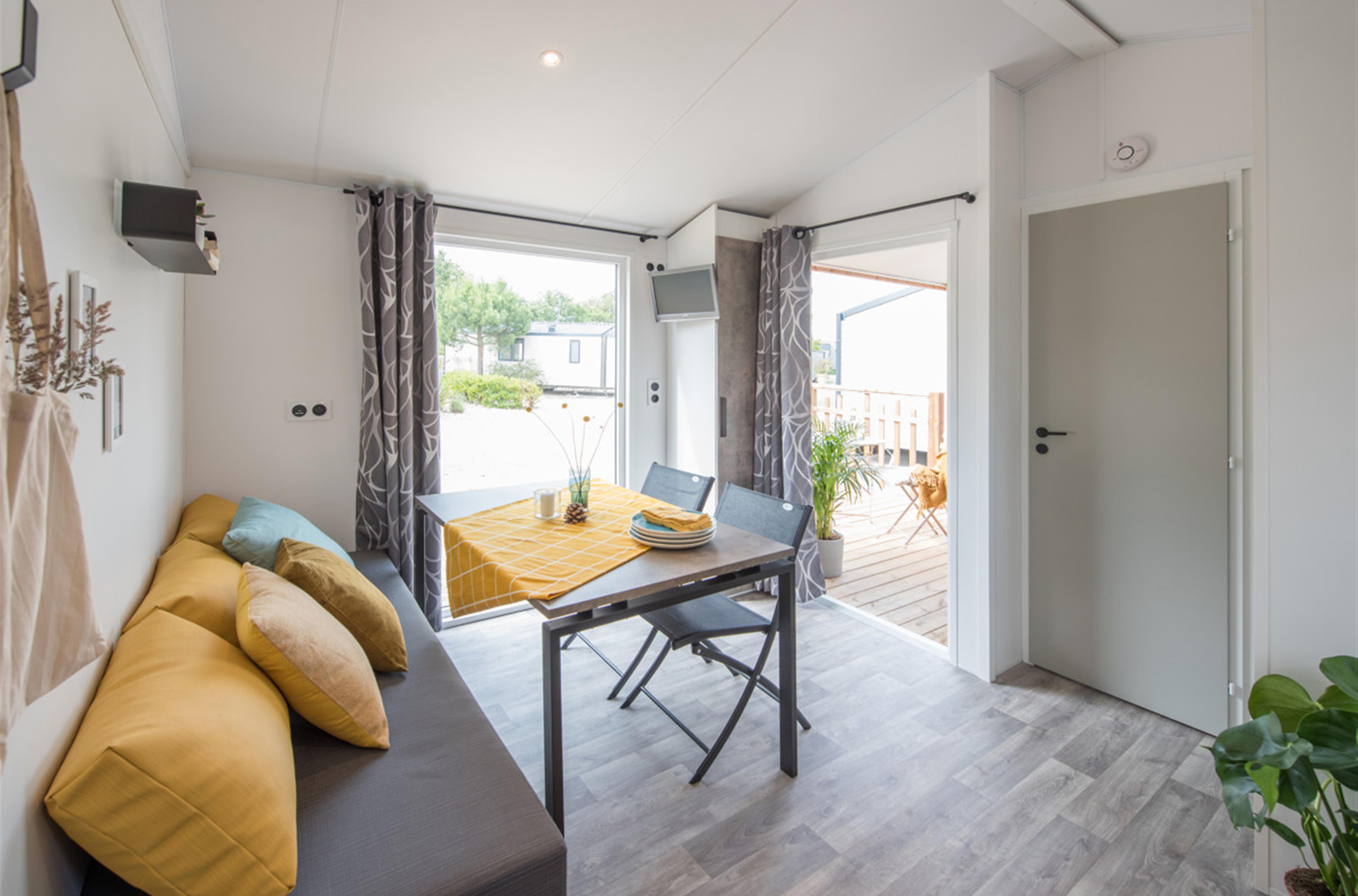 Salon dans le chalet Club Camping de la plage 29950 Bénodet